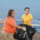 Illustration for article titled Rescuers Heroically Help Beached Garbage Back Into Ocean